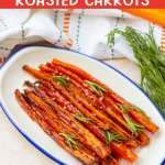 maple glazed roasted carrots garnished with parsley on a plate.
