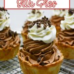 mini chocolate silk pie on a wooden board.