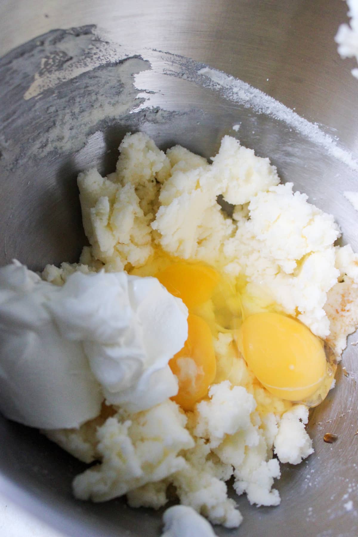 sour cream, butter, eggs, and sour cream in a stand mixer.
