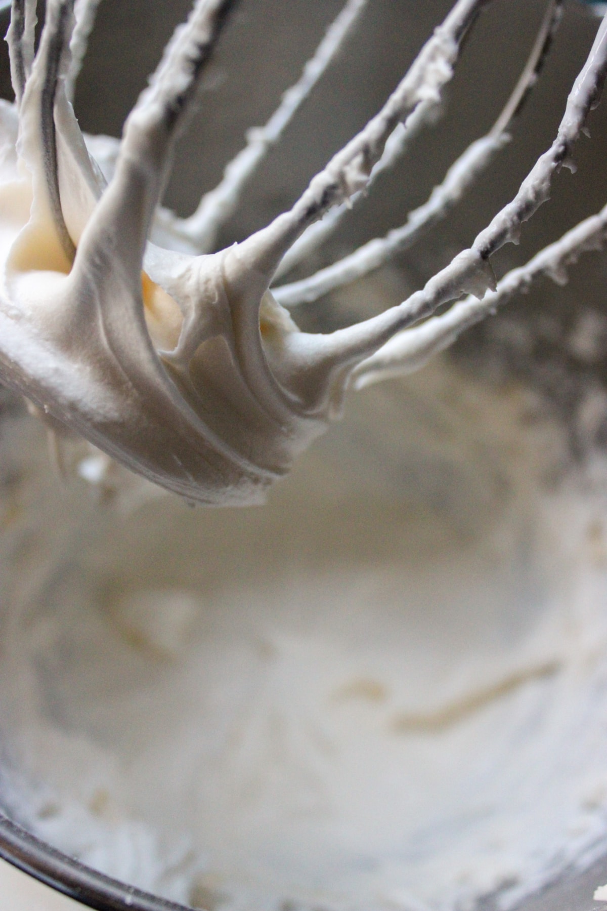 frosting being made in a stand mixer.
