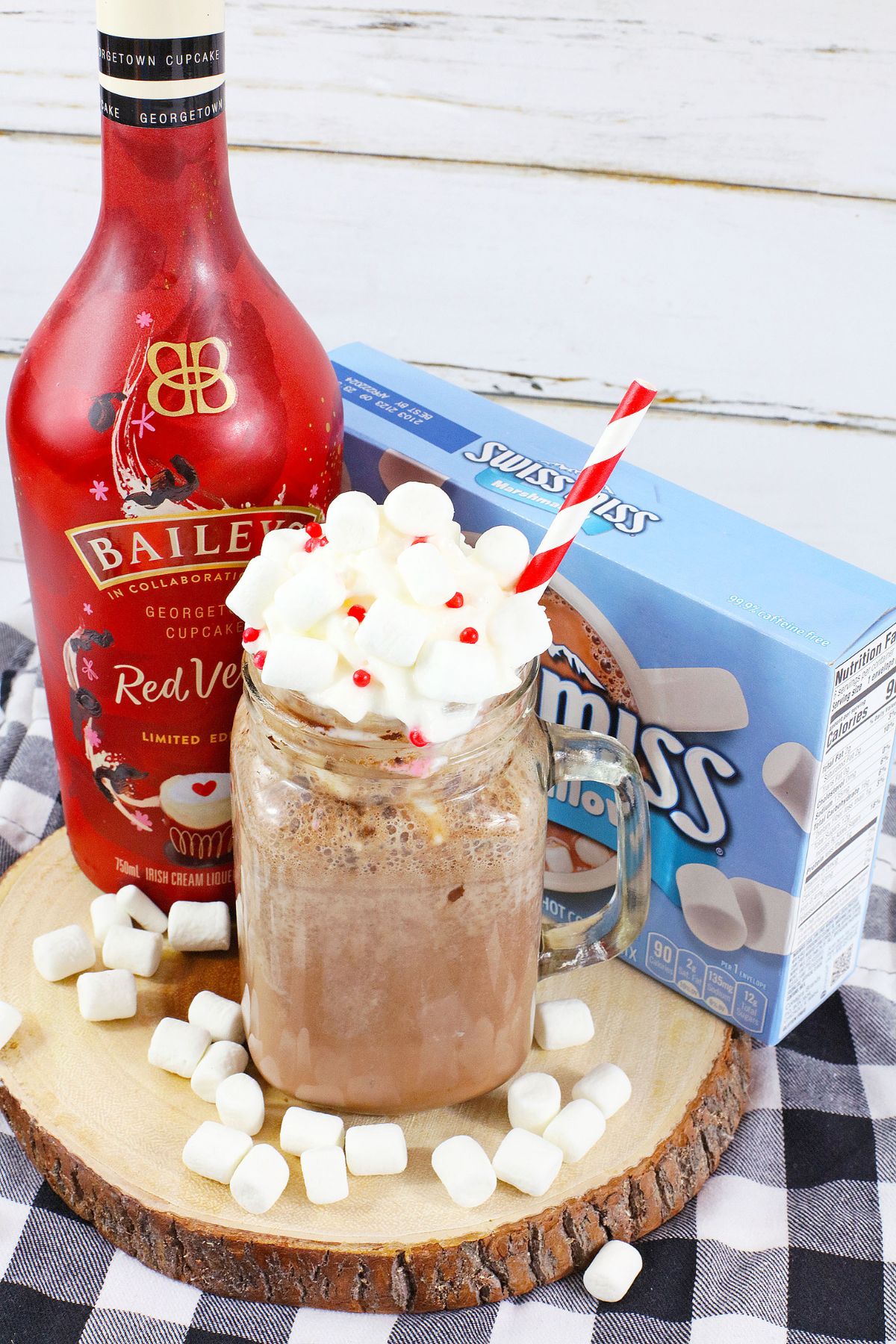 glass mug full of red velvet baileys hot chocolate.