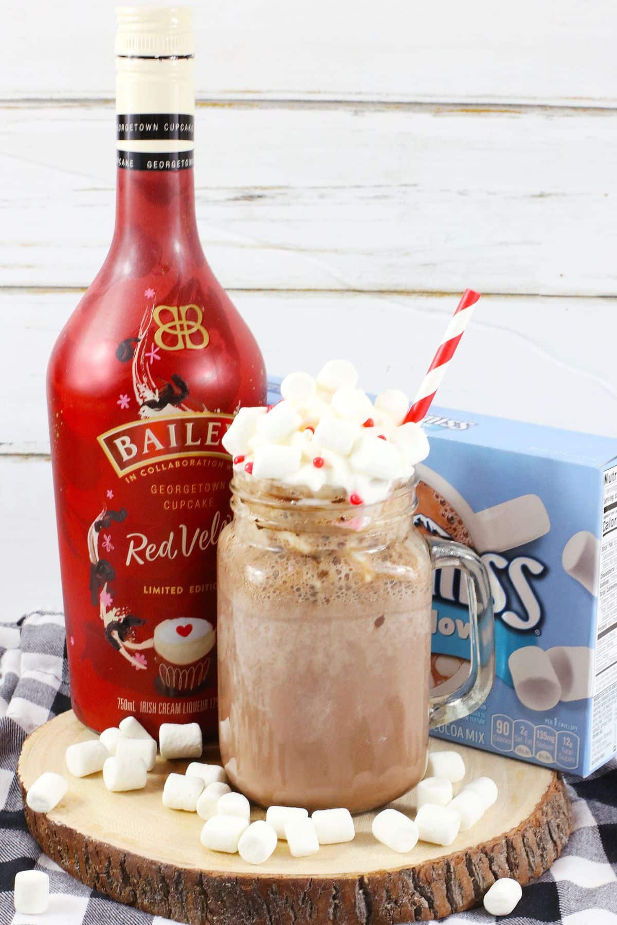 glass mug full of red velvet baileys hot chocolate.