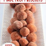donut holes from biscuit dough coated in a cinnamon sugar on a serving platter.