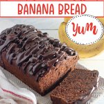 loaf of triple chocolate banana bread with a slice cut.