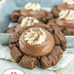 chocolate silk cookies on a kitchen towel.