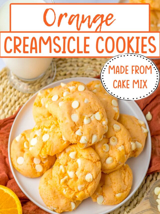 stack of orange creamsicle cookies on a plate.