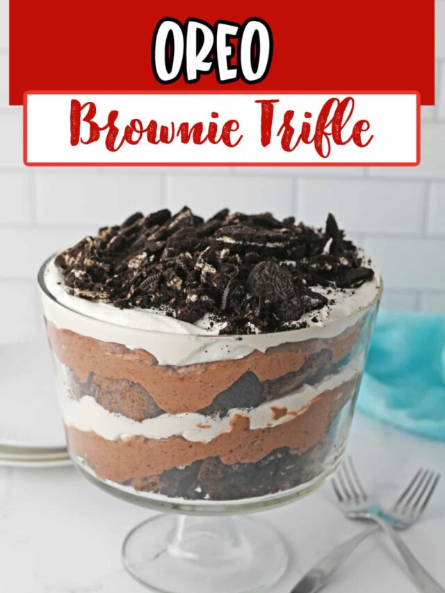 trifle bowl filled with oreo brownie trifle on a counter.