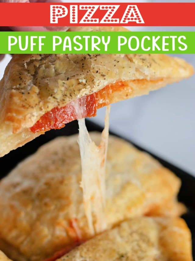 puff pastry pizza pockets on a plate with one held in a woman's hand.