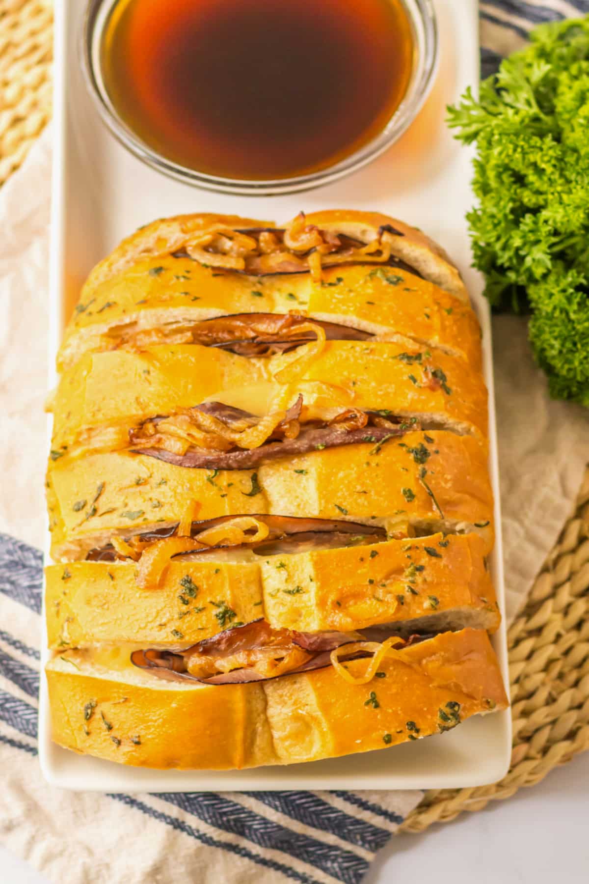 french dip pull apart bread on a serving platter.