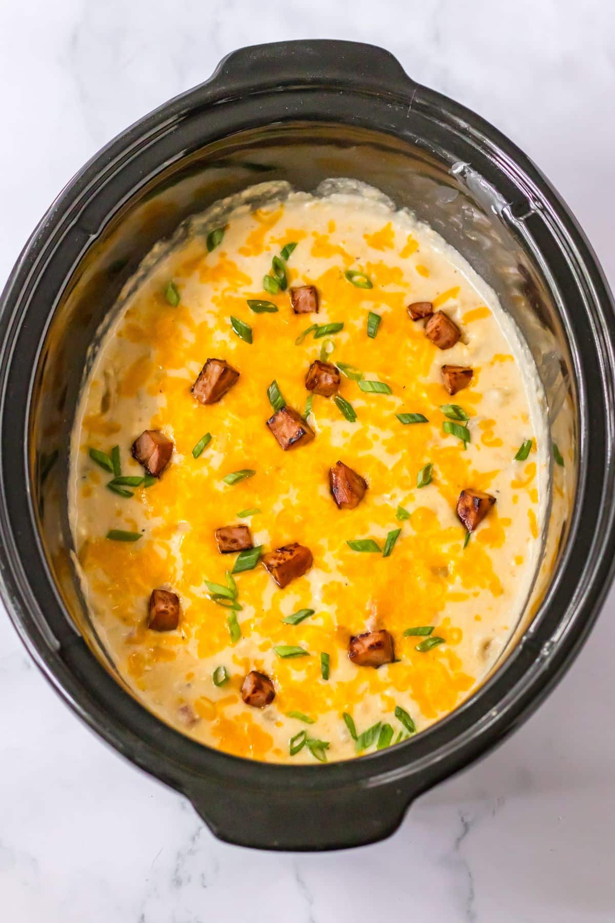 ham and potato soup cooked in a slow cooker.