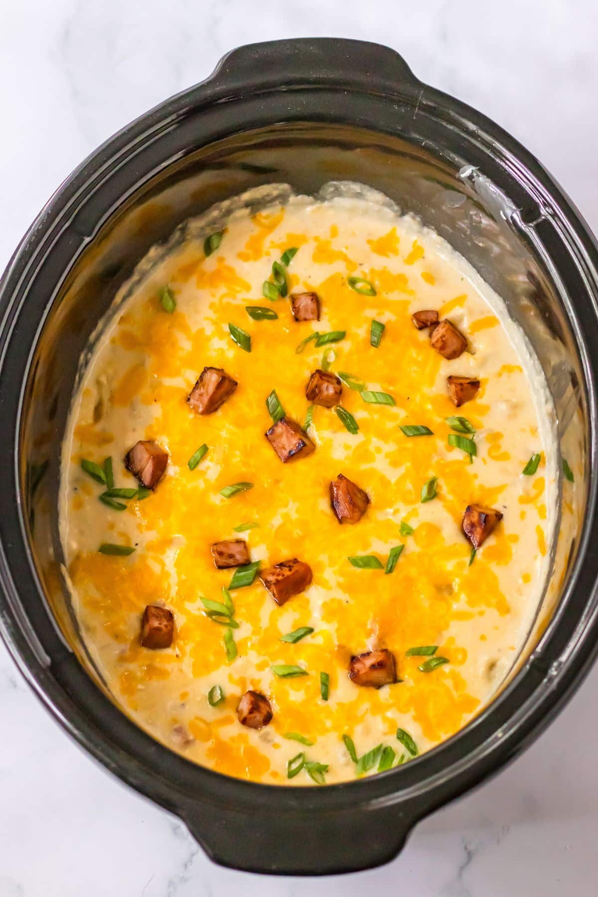 ham and potato soup cooked in a slow cooker.