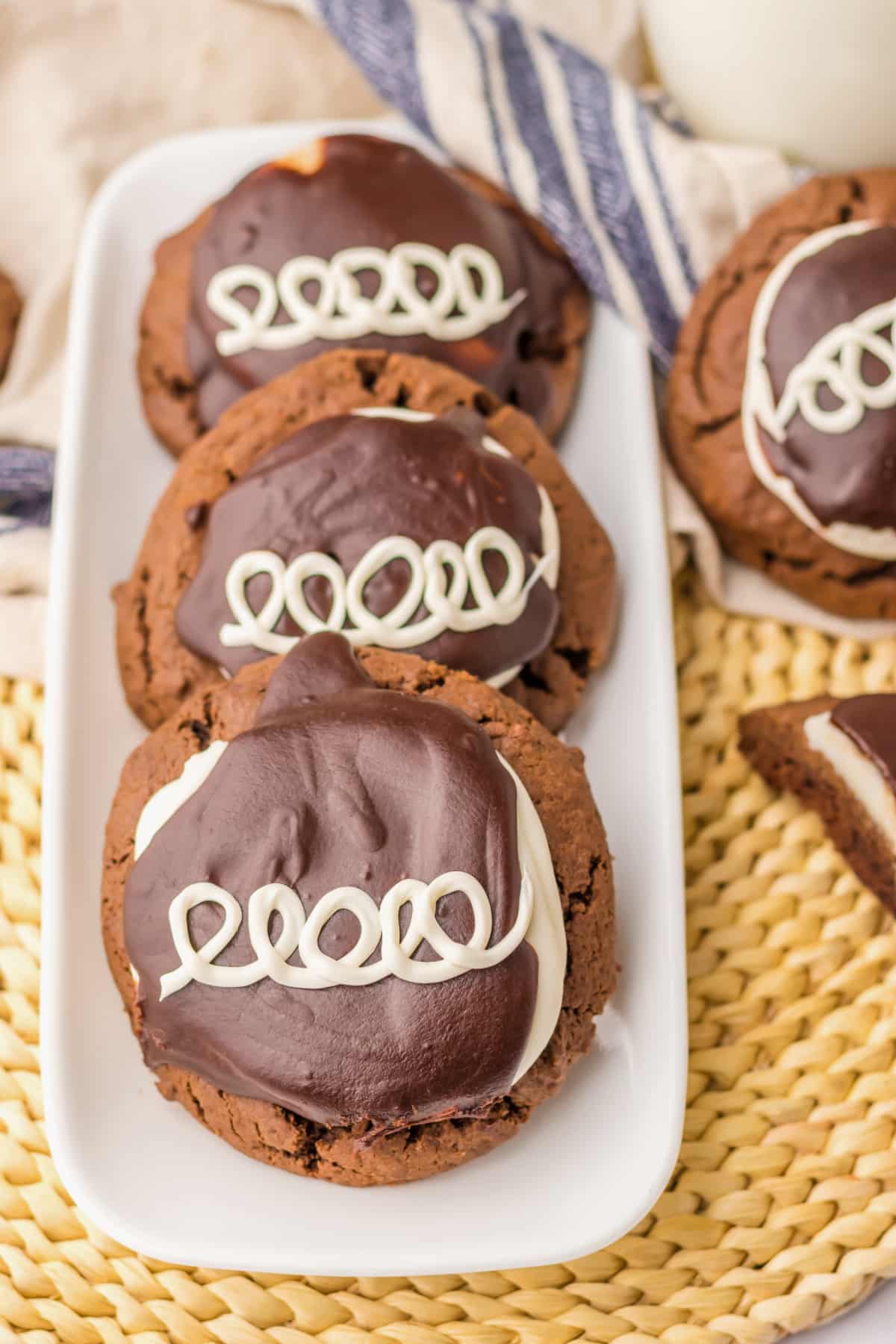 three hostess cupcake cookies lined on a platter.