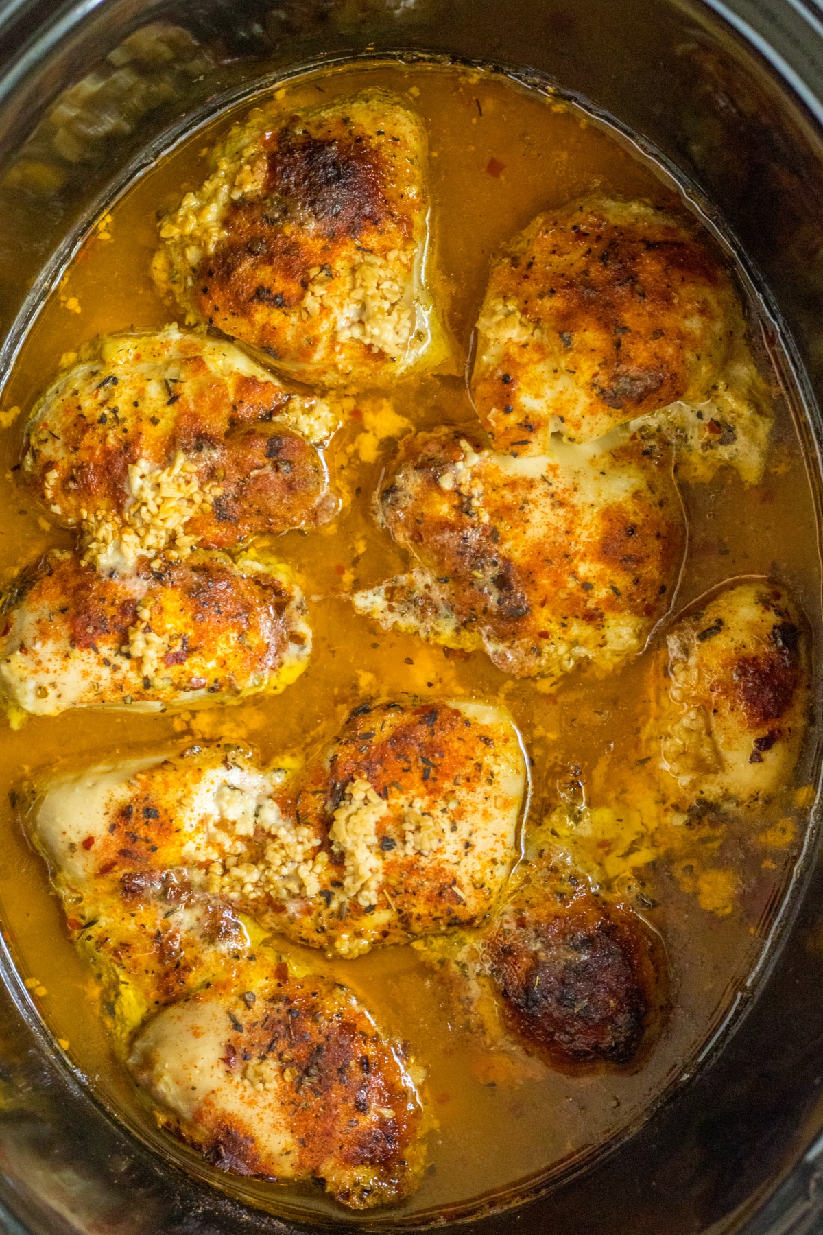 cooked lemon chicken thighs in a slow cooker.
