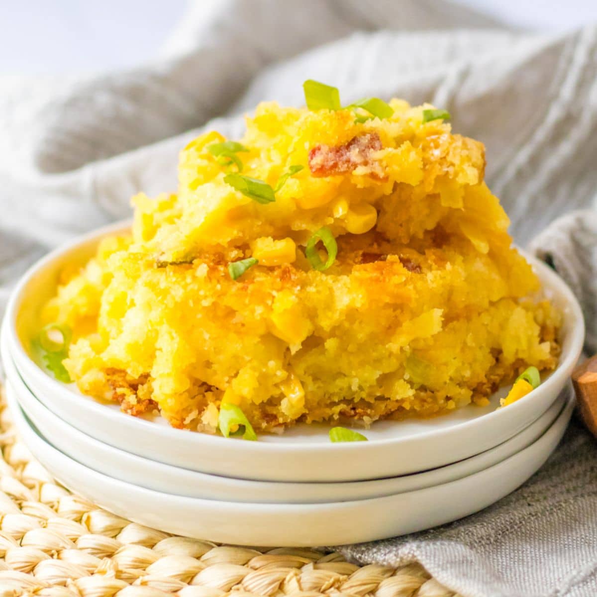 plate full of loaded cornbread casserole.