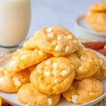 stack of orange creamsicle cookies on a plate.