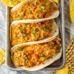 three rotel tacos on a serving tray.