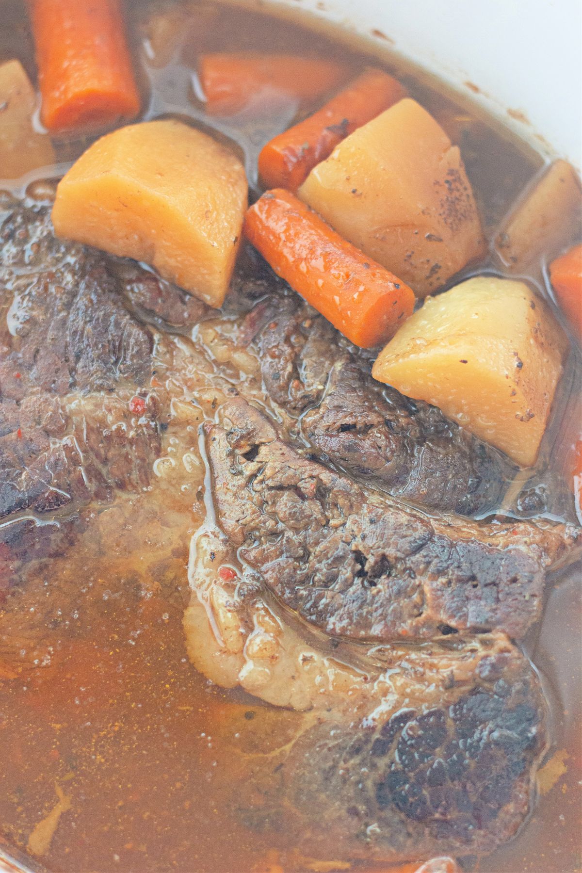 cooked roast in a slow cooker.