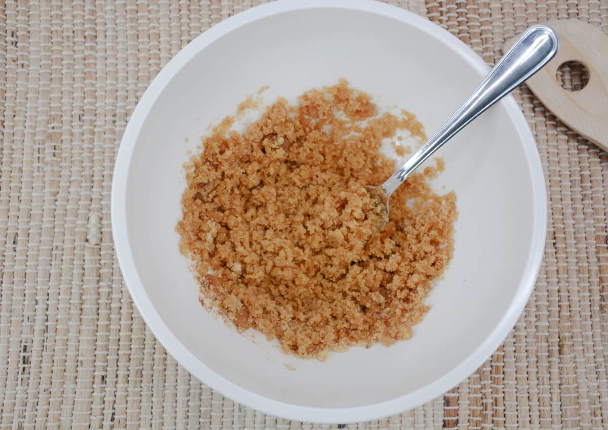 brown sugar topping being mixed in bowl.
