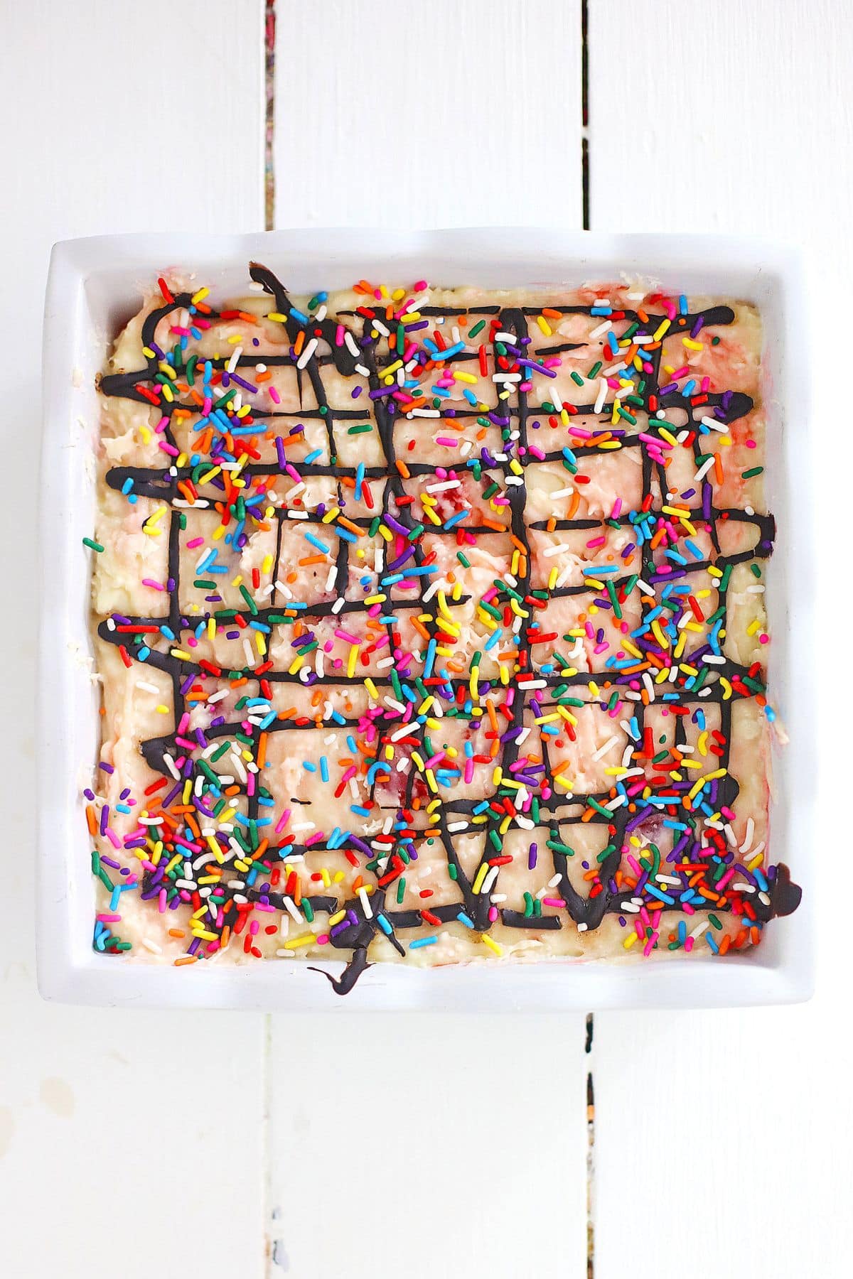 finished fudge in a square casserole dish.