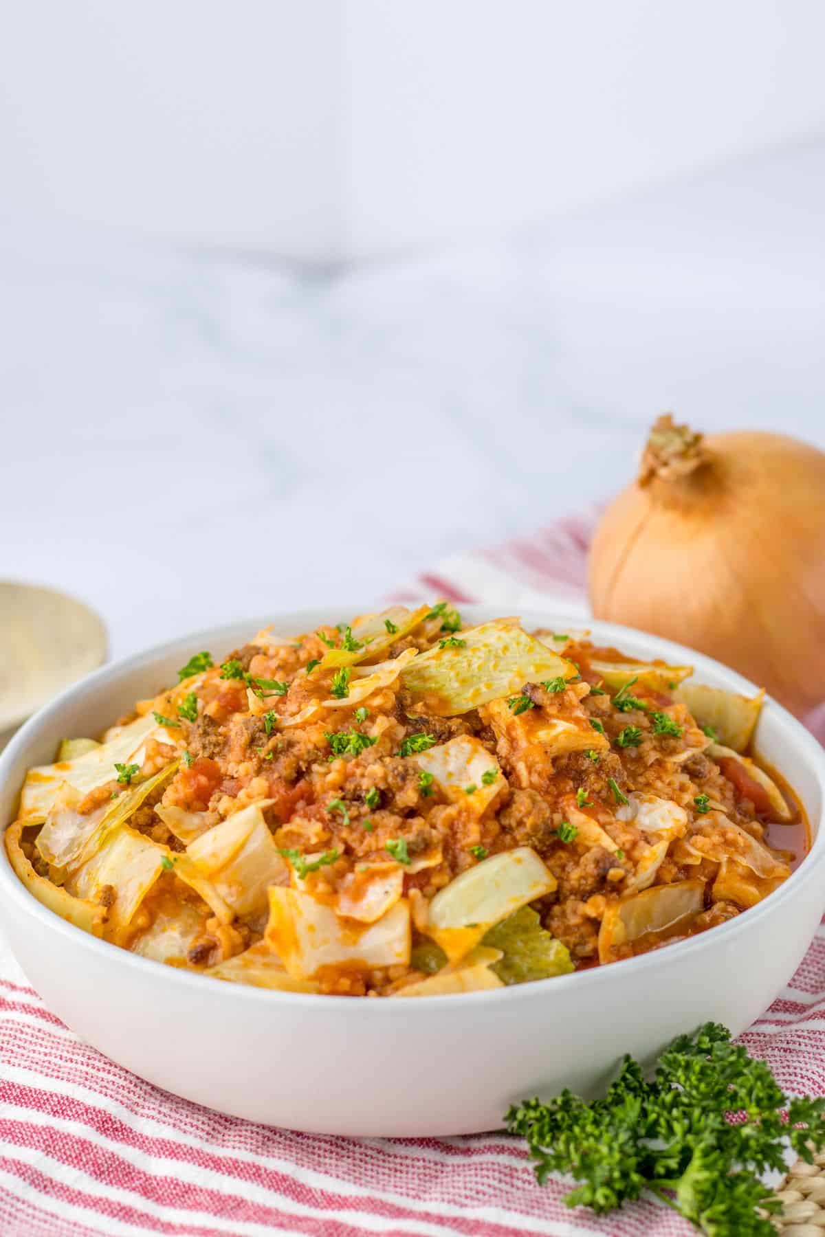 bowl full of cabbage roll soup on a counter.