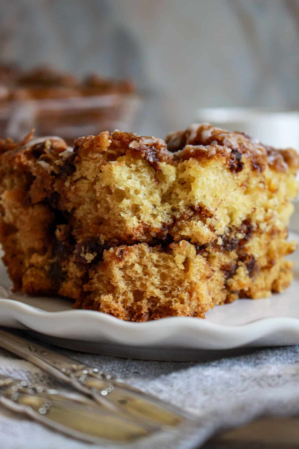 slice of chocolate orange coffee cake on a plate.