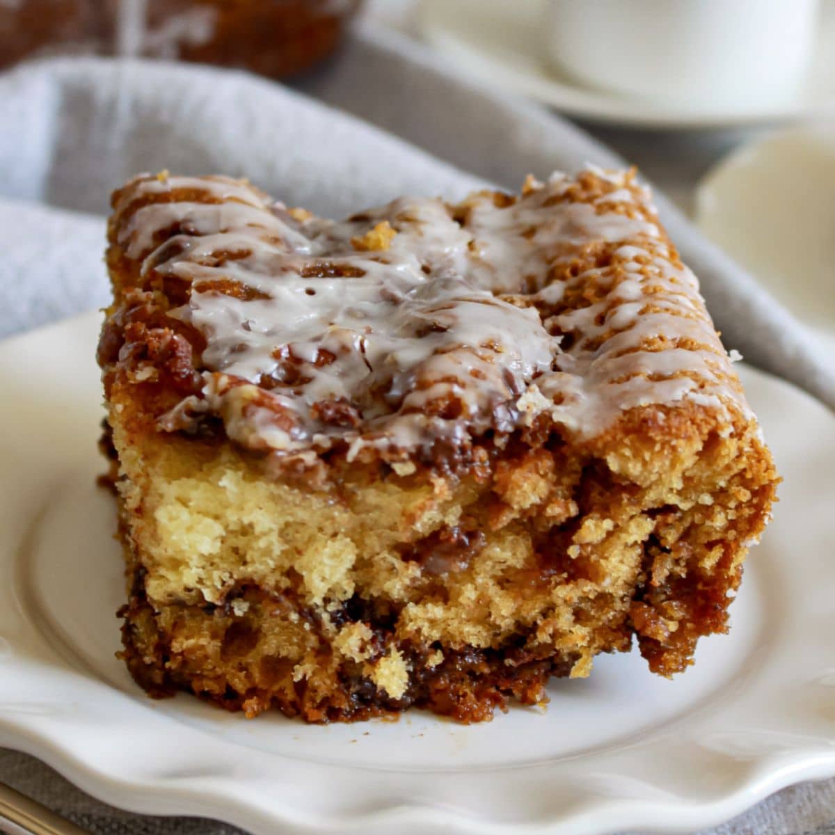 slice of chocolate orange coffee cake on a plate.