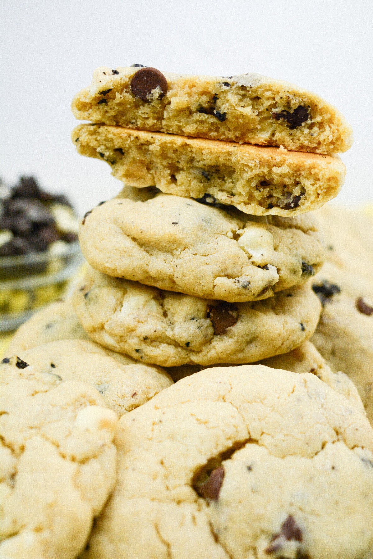 stack of cookies with the top one broken in half.