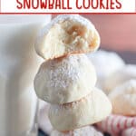 four cream cheese snowball cookies stacked on top of each other.