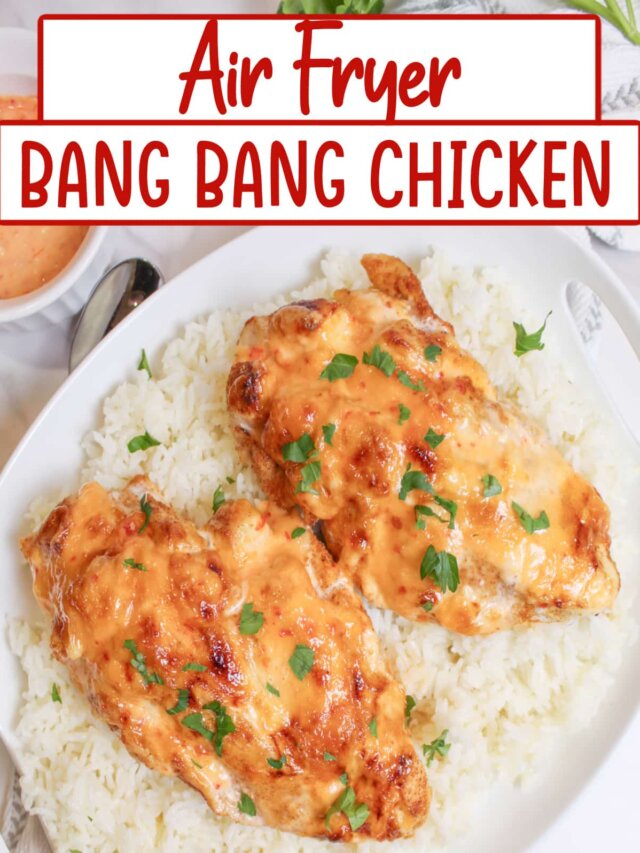 air fryer bang bang chicken on top of a bed of white rice on a plate.