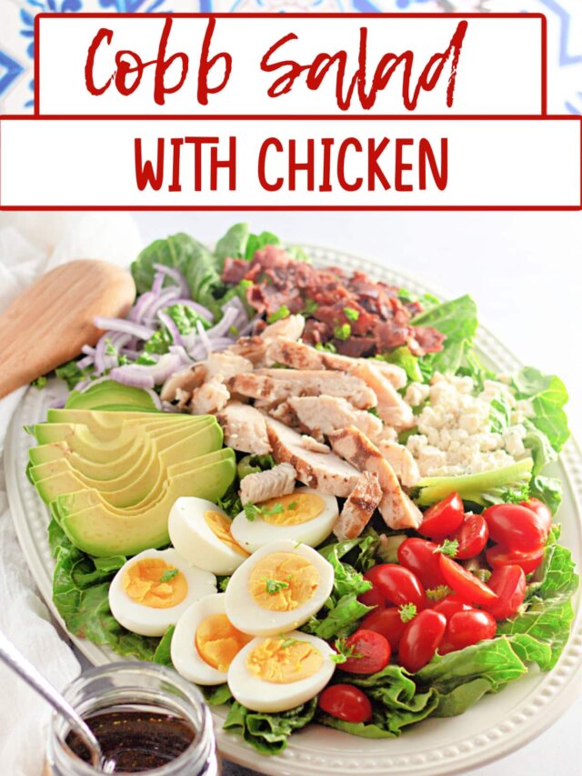 cobb salad layered on a large serving platter.