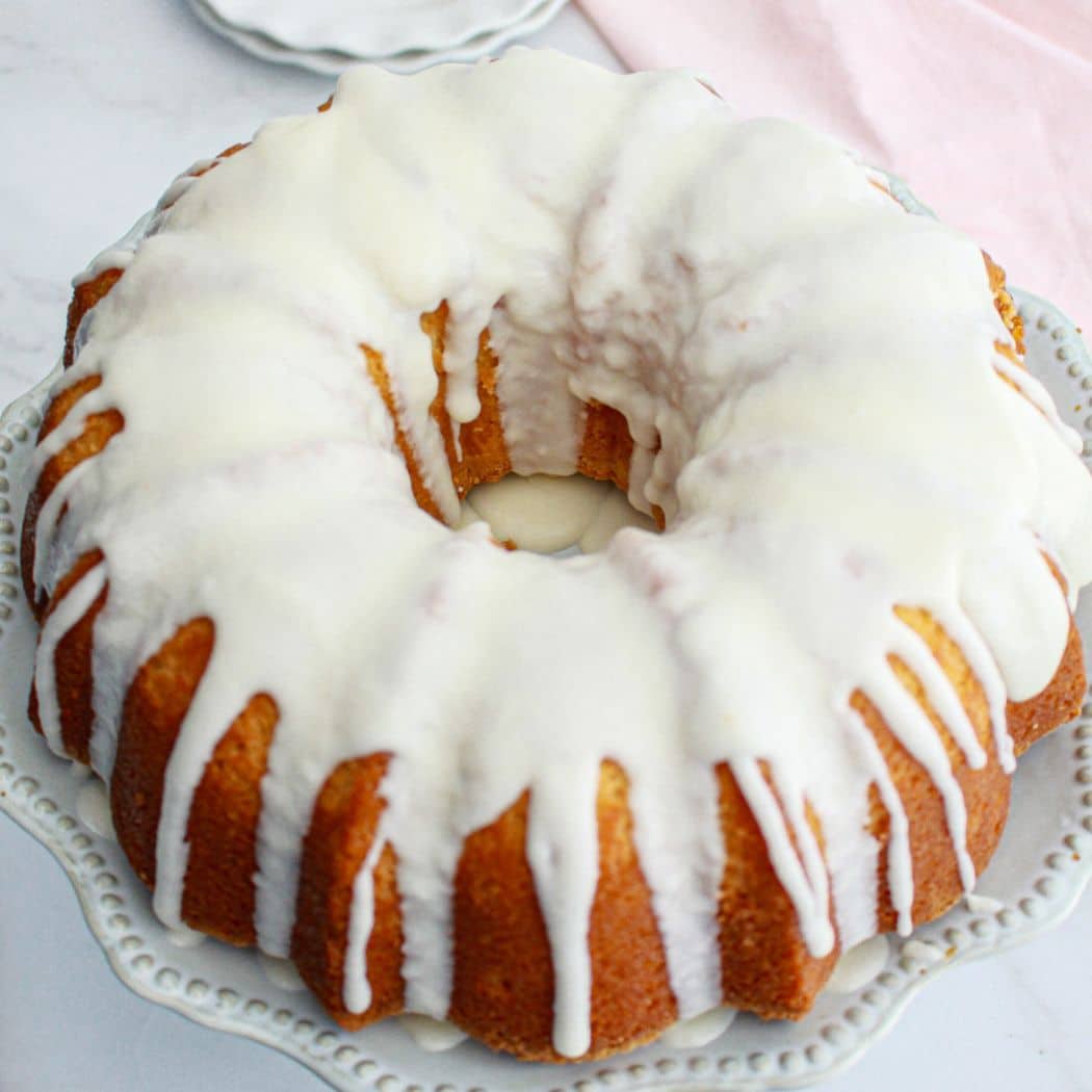 finished million dollar pound cake on a cake plate.