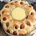 pigs in a blanket pull apart on a plate.