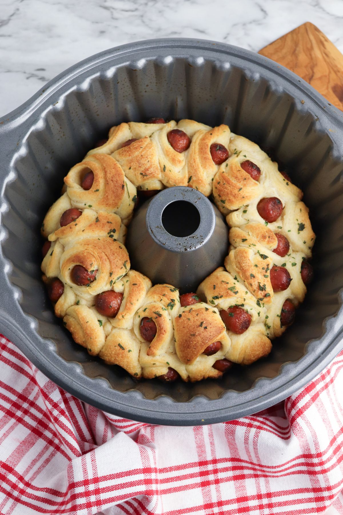 baked pigs in a blanket in a bundt pan.