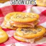 three ritz ham and cheese sandwiches stacked in a pyramid.