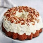 uncut pound cake on a plate.