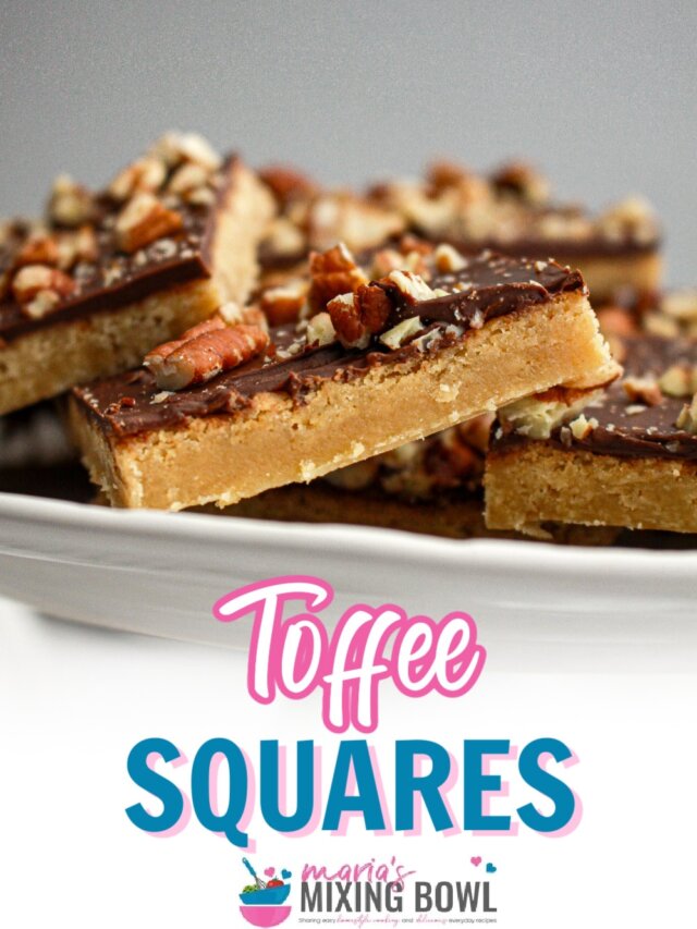 pieces of toffee squares on a cake plate.