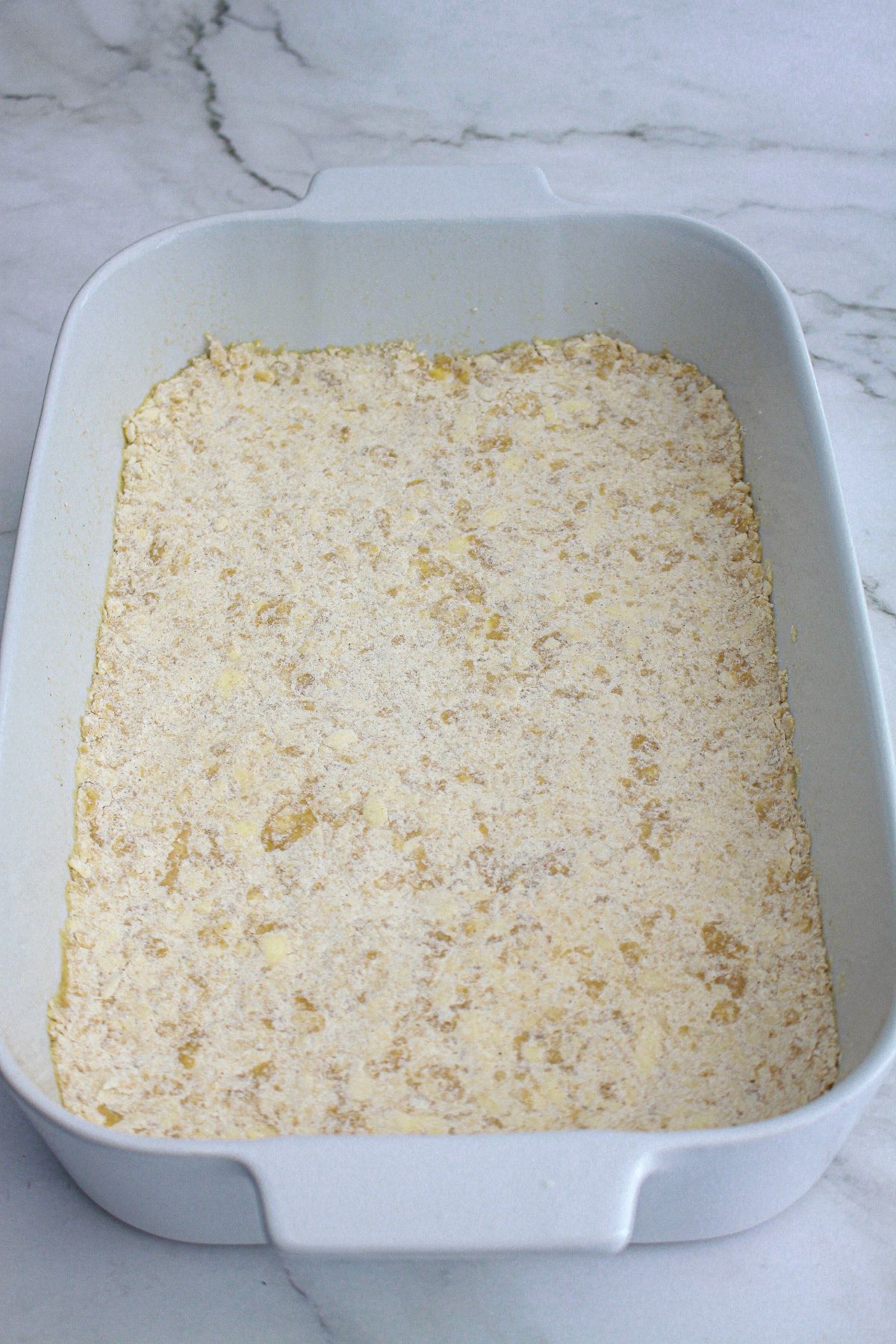 crumble crust pressed into the bottom of a casserole dish.