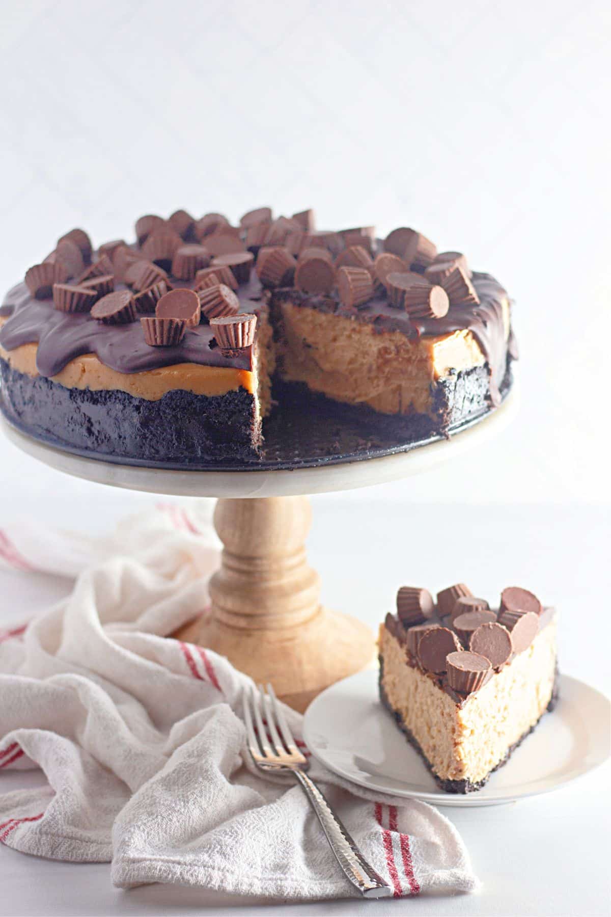 slice of reese's cheesecake on a small plate.
