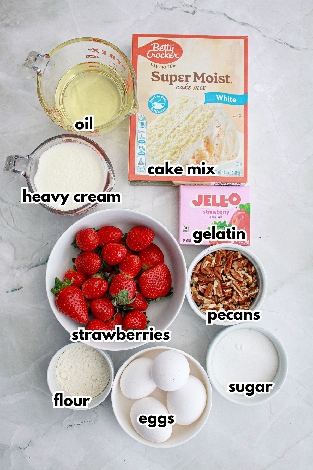 oil, heavy cream, strawberries, gelatin, cake mix, flour, eggs, sugar, and pecans.