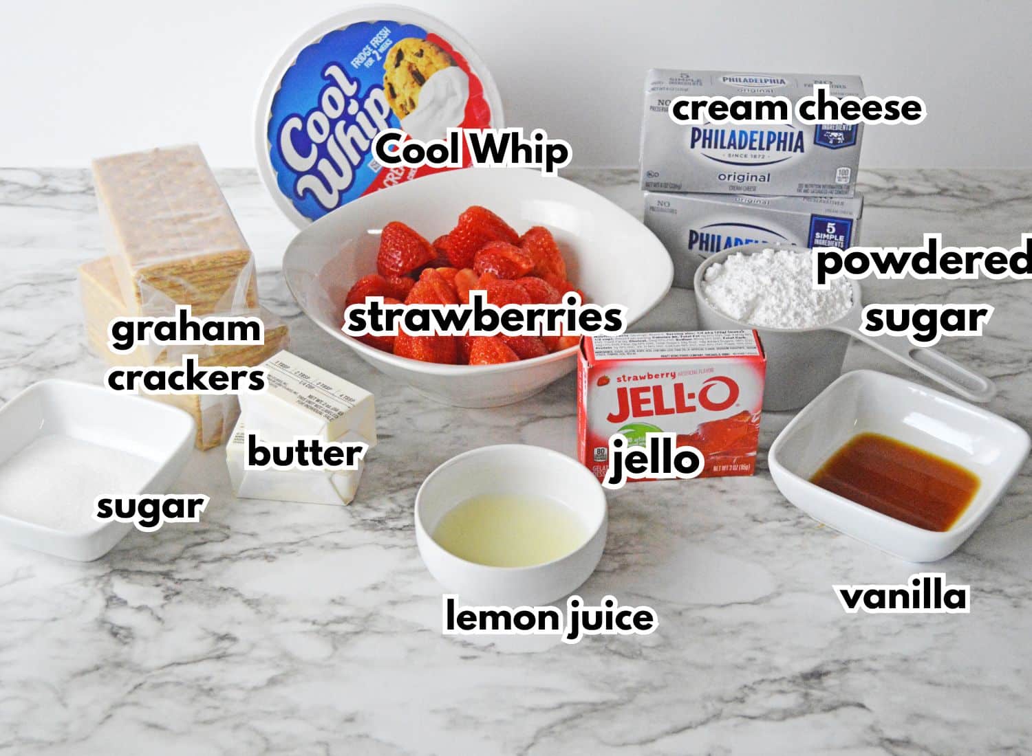 graham crackers, sugar, butter, strawberries, Cool Whip, Jello, Lemon Juice, cream cheese, powdered sugar, and vanilla.