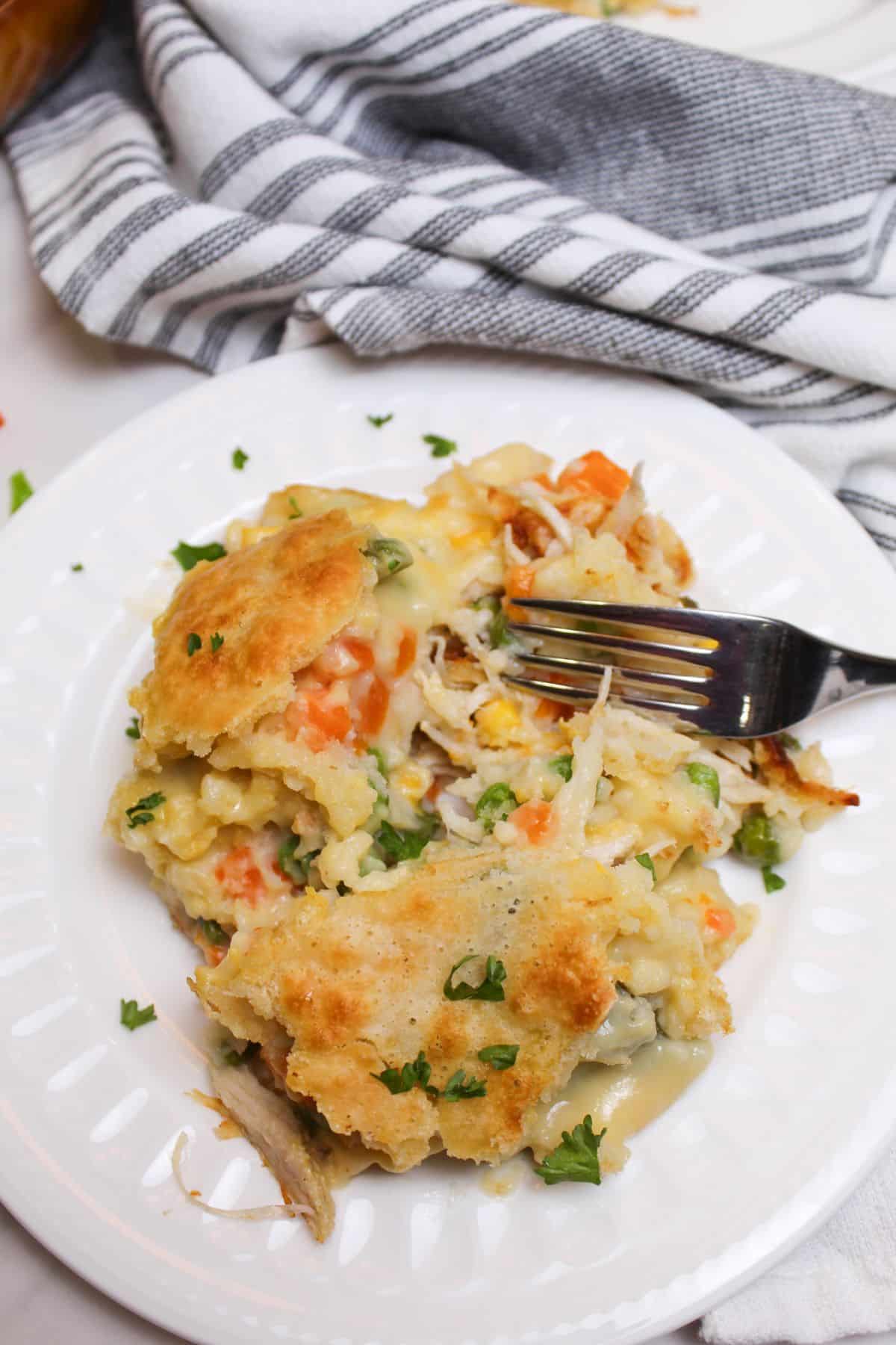 slice of tiktok chicken cobbler on a plate.