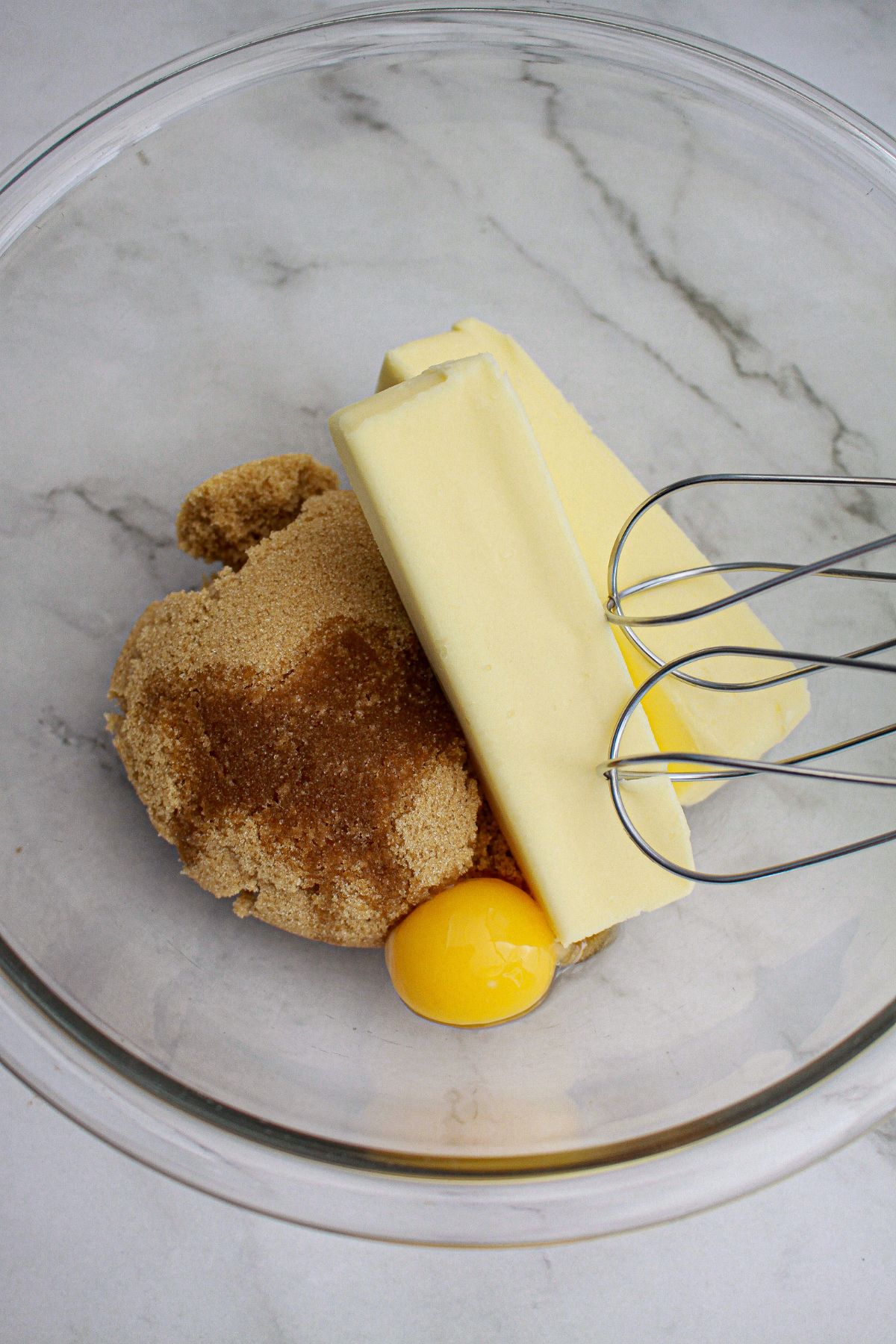 butter, brown sugar, and eggs in a large bowl with a hand mixer.