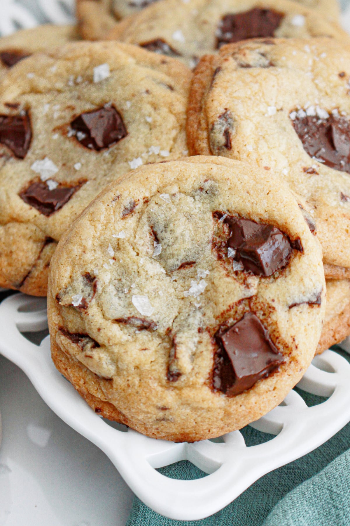 chocolate chunk sea salt cookies on a serving plate.