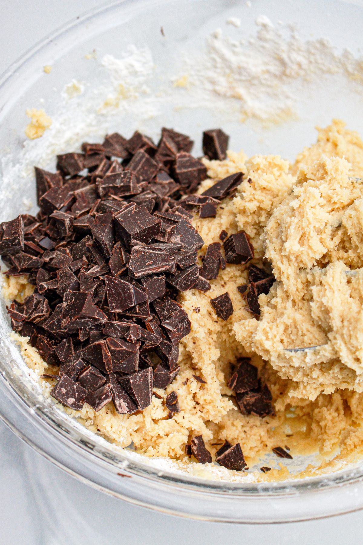chocolate chunks in a glass mixing bowl.