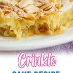 slice of crinkle cake on a plate with a bite missing.