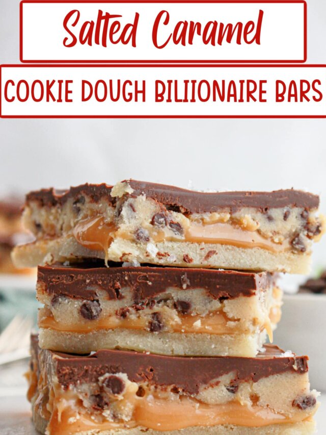 three salted cookie dough billionaire bars stacked on top of each other on a counter.