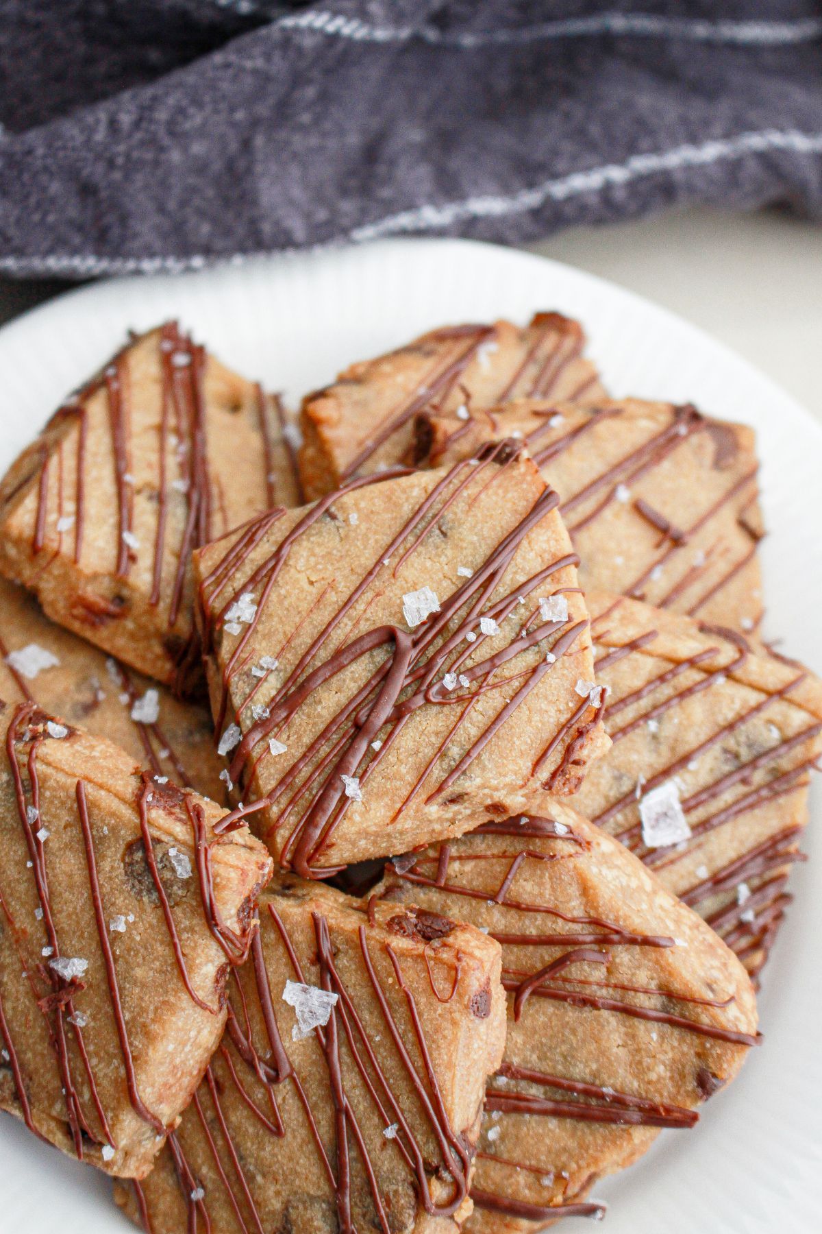 espresso shortbread being stacked on a plate.