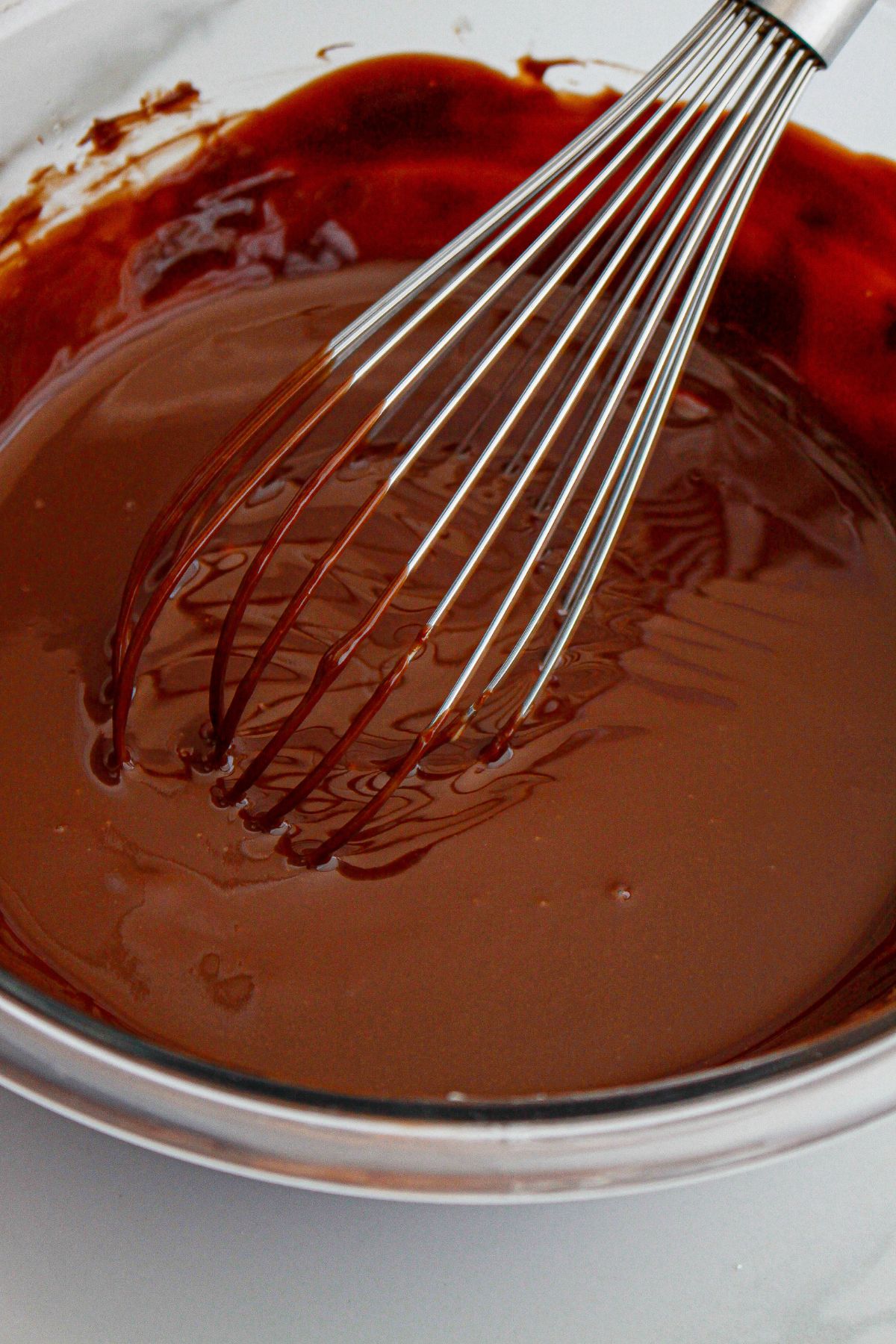 chocolate and butter being melted in a double boiler.