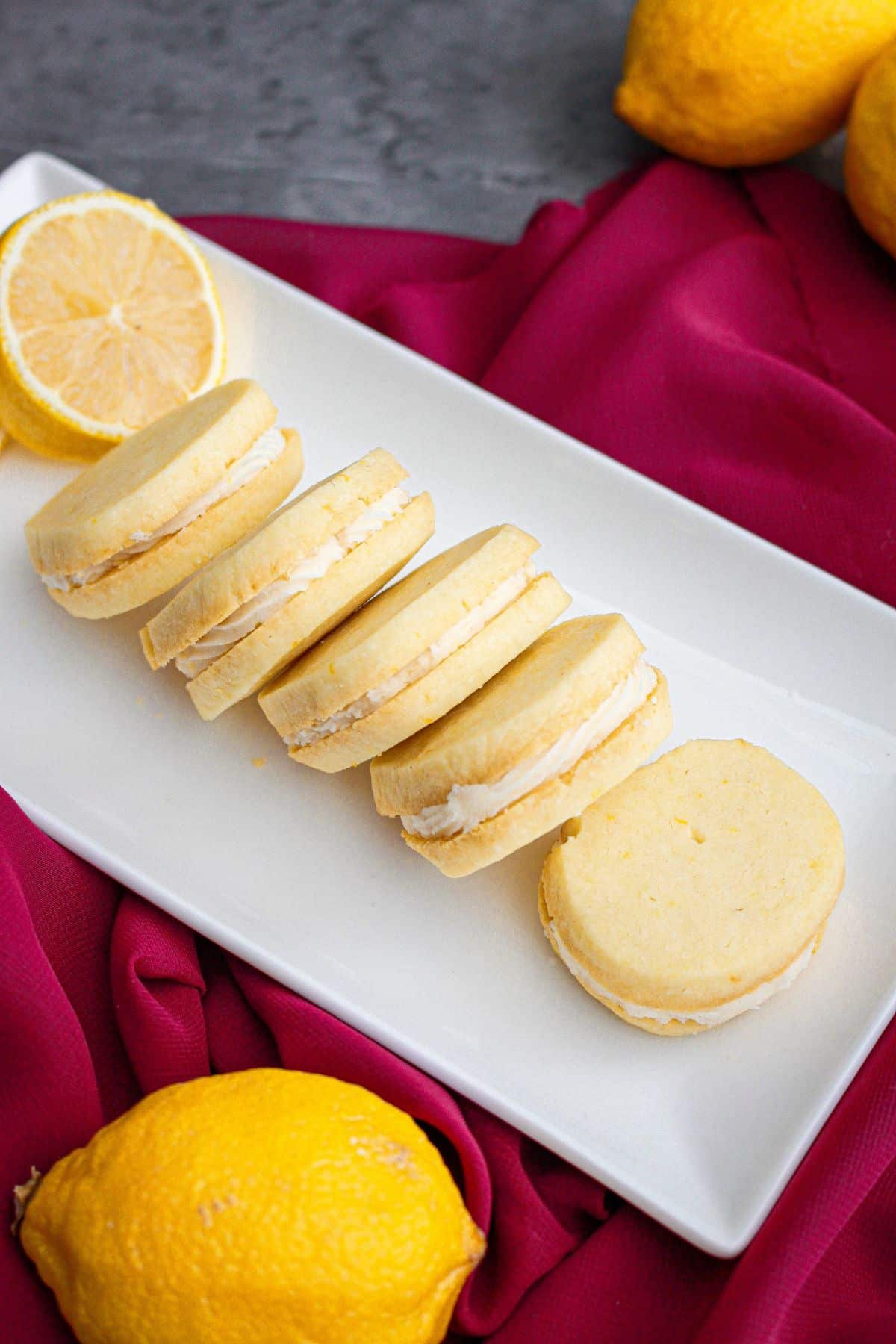 5 lemon meltaway cookies on a platter.