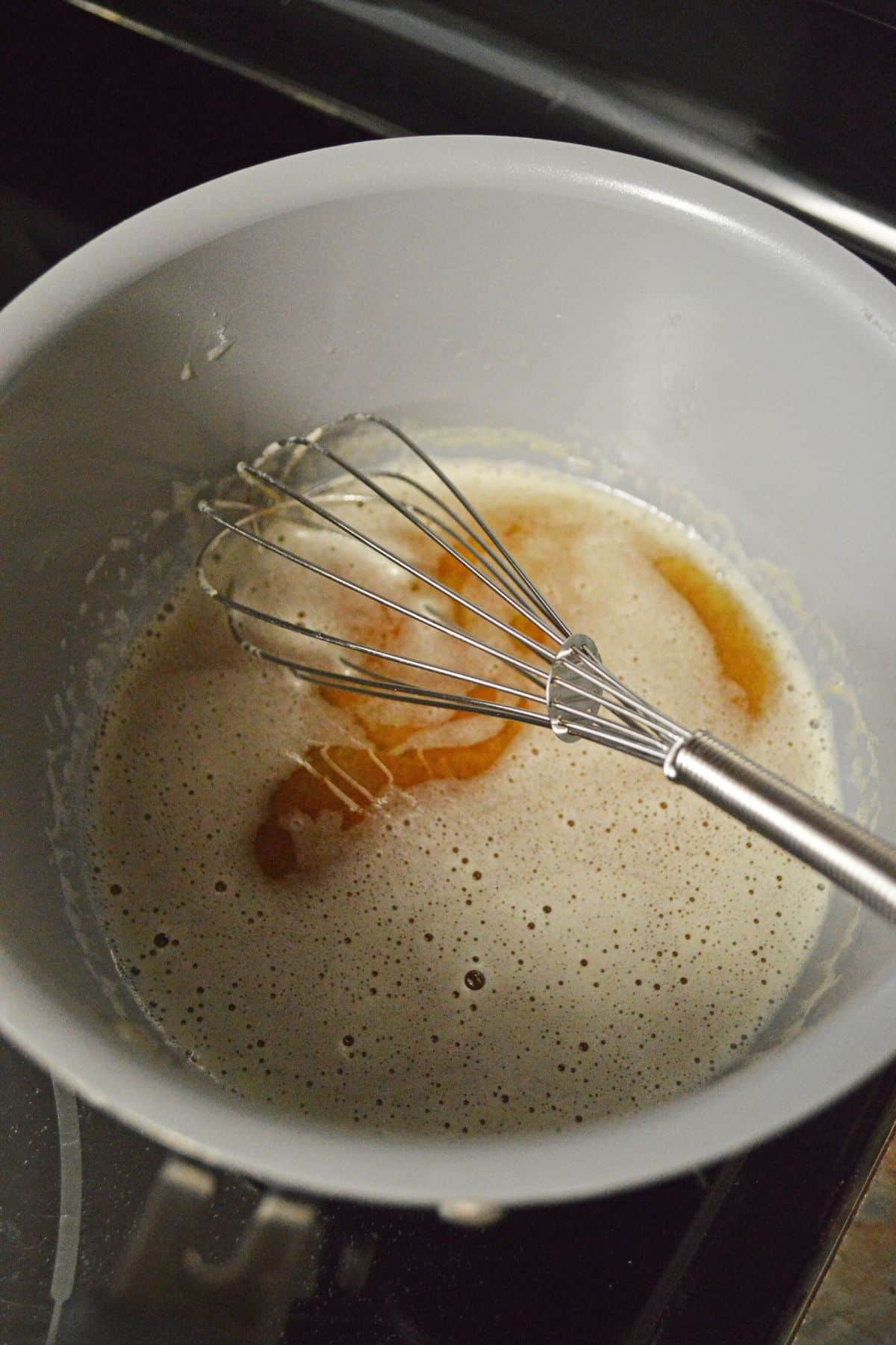 butter being browned in a saucepan.